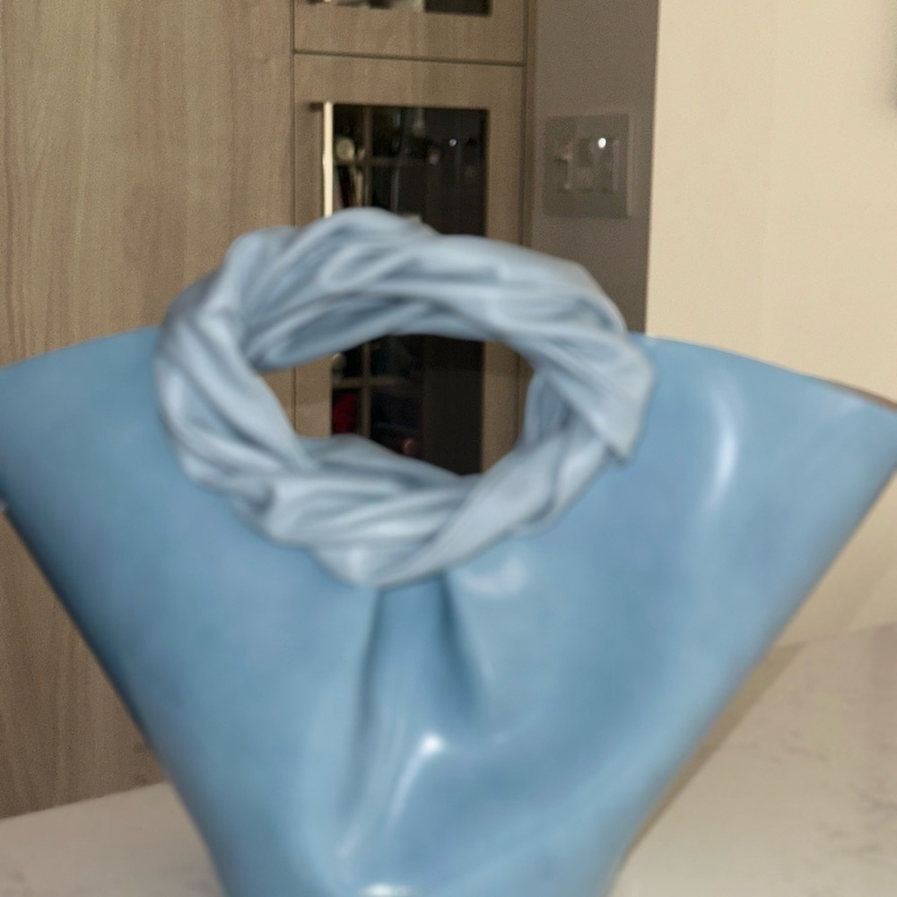 Modern Blue Handbag with Twisted Handle